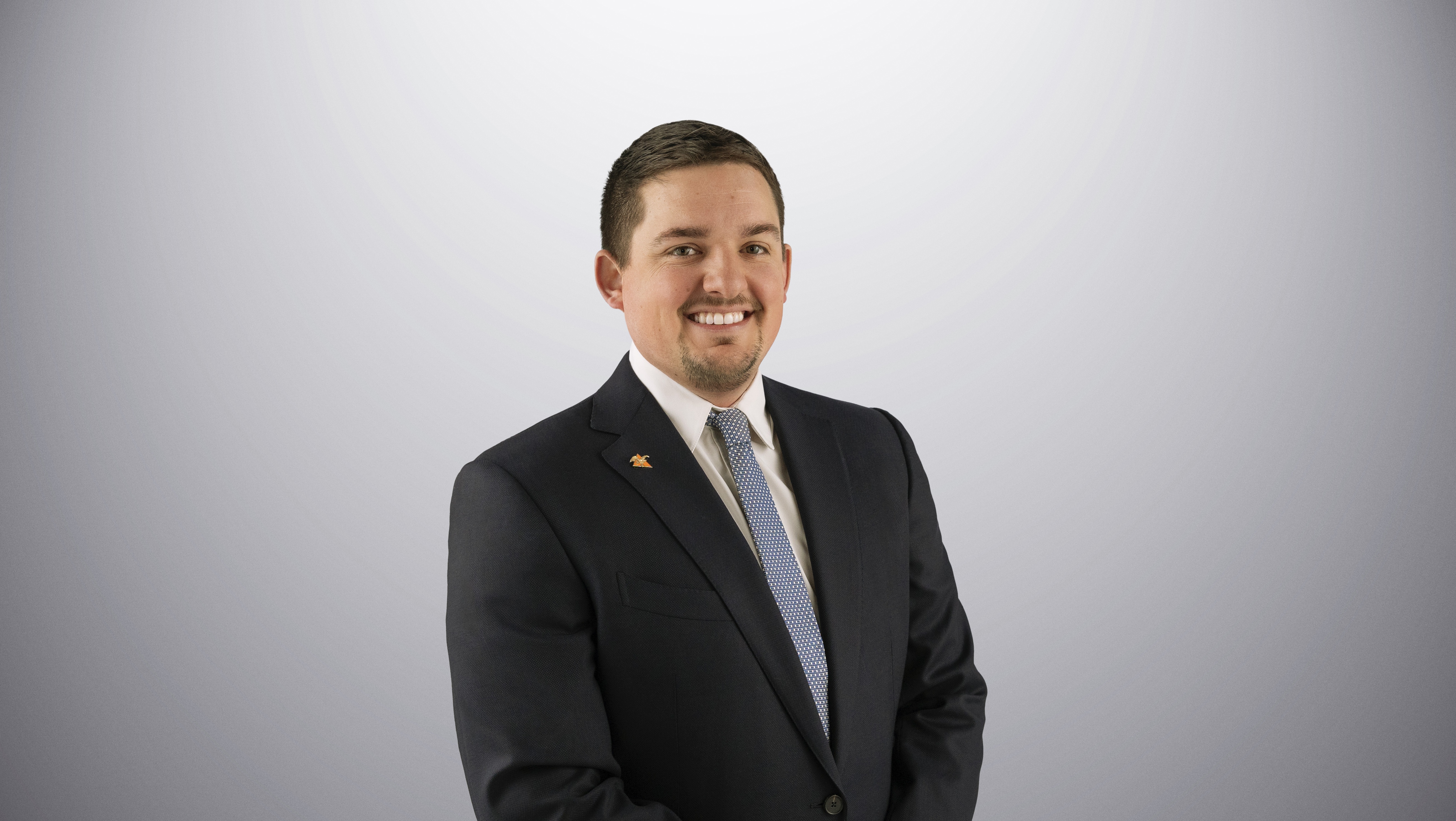 Cameron Wanek is smiling looking at the camera