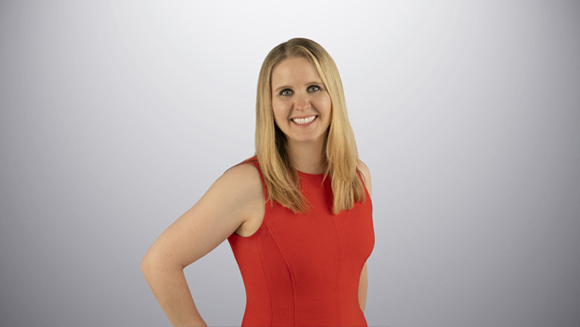 Laura Forsythe is smiling looking at the camera