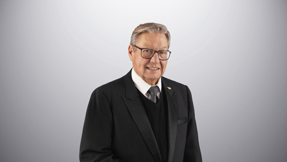 Ron Wanek is smiling looking at the camera