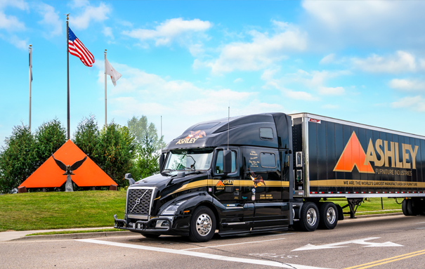 Ashley Truck at a stop light, next to the Ashley A and 3 flags